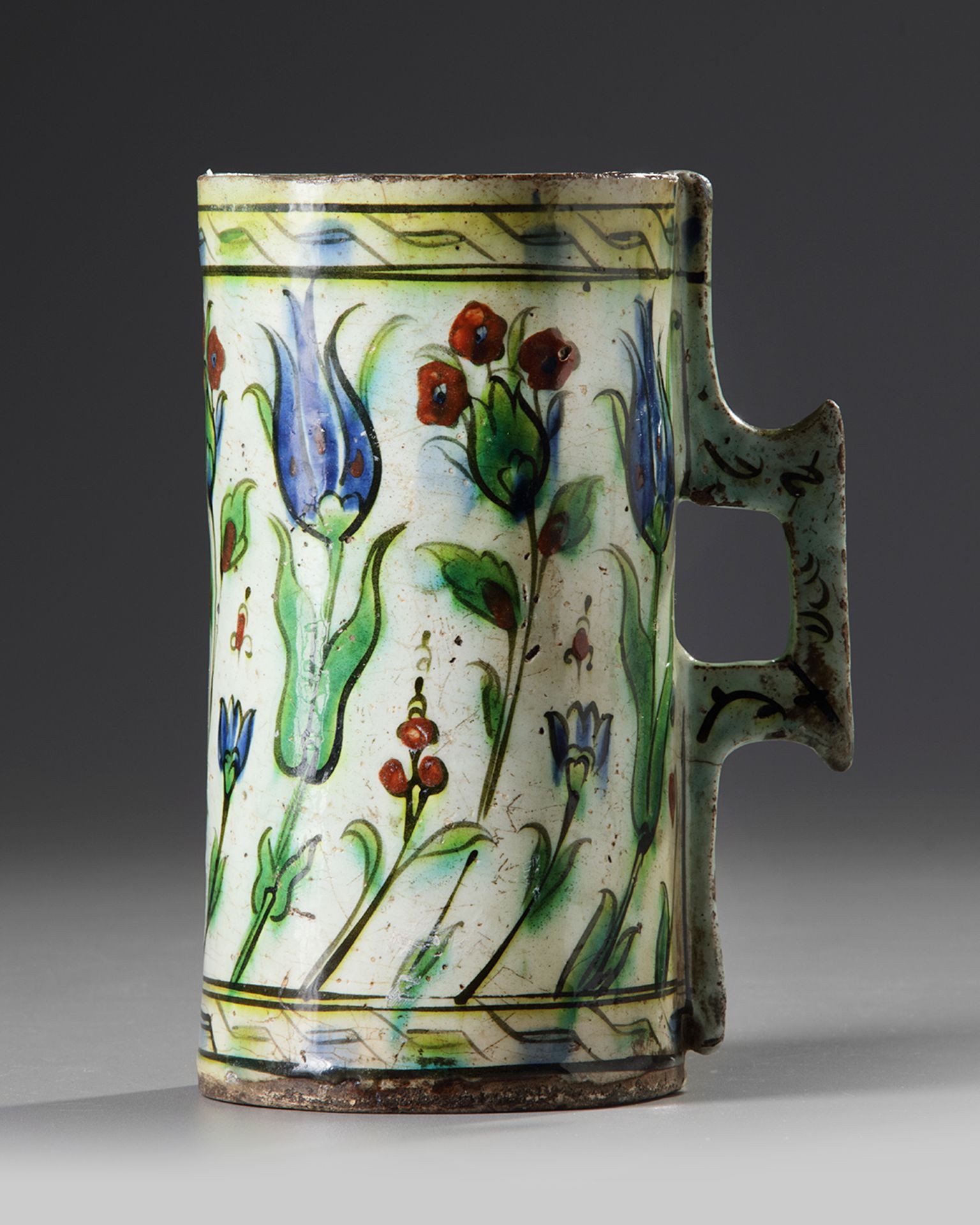 An Ottoman Iznik pottery tankard