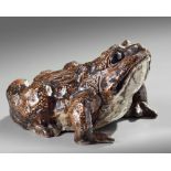 A Japanese ceramic figure of a frog