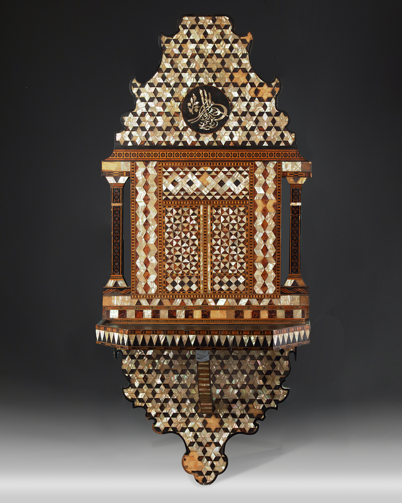 An Ottoman wooden mother-of-pearl inlaid Turan holder
