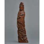 A Japanese box wooden figure depicting bodhisattva Kannon