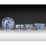 Three Chinese blue and white bowls and a dish