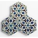 Three Ottoman hexagonal Iznik tiles