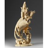 A Chinese ivory carving of a Guanyin on a phoenix