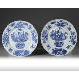 A pair of Chinese blue and white 'flower basket' dishes