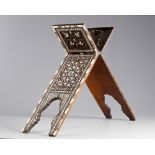 An Islamic wooden mother-of-pearl inlaid Quran stand