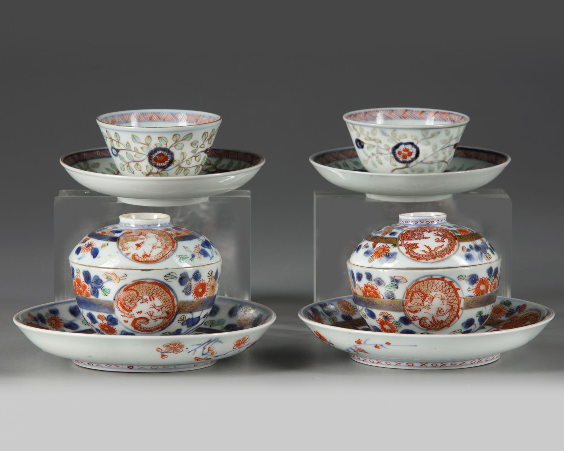 A lot of Japanese Imari bowls, cups and saucers