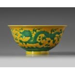 A Chinese yellow-ground green-enamelled 'dragon' bowl