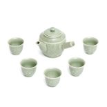 A Japanese Nabeshima-ware celadon sencha-tea set consisting of a tea pot