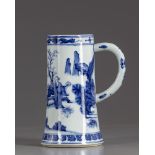 A Chinese blue and white mug