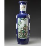 A large Chinese blue ground famille verte rouleau vase