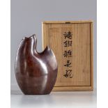 A Japanese bird shaped bronze vase