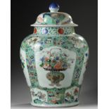 A large Chinese famille verte baluster vase and a wucai cover