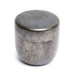 A Japanese silver tea caddy (natsume) with a ‘blown sand’ (fumon) relief