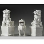 A group of three Chinese white-glazed Buddhist lions