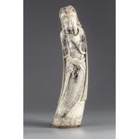 A Chinese ivory figure of Guandi