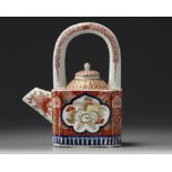 A Japanese Imari arch-handled teapot and cover