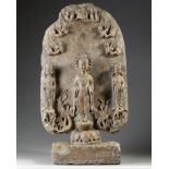 A large Chinese stone stele Buddhist triad