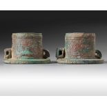 A pair of Chinese bronze axle caps