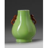 A small Chinese lime green-ground hu-vase