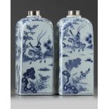 A pair of Chinese blue and white square bottles and silver covers