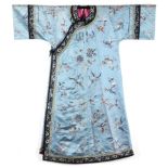 A Chinese pale blue ground embroidered lady's informal robe