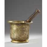 A Mamluk bronze pestle and mortar