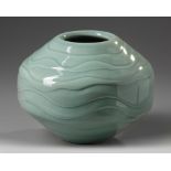 A modern Japanese celadon ceramic vase in a box