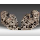 A rare set of two plain wooden corbels from Ky?sh? with carved Chinese lions (karashishi)