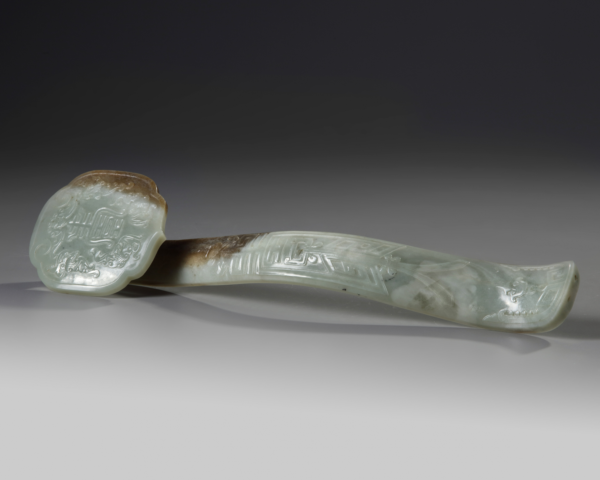 A Chinese pale celadon jade scepter