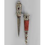 An Ottoman dagger with silver precious stone inlaid hilt