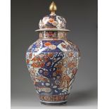 A large Japanese Imari vase and cover