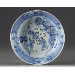 A Chinese blue and white pierced tripod basin