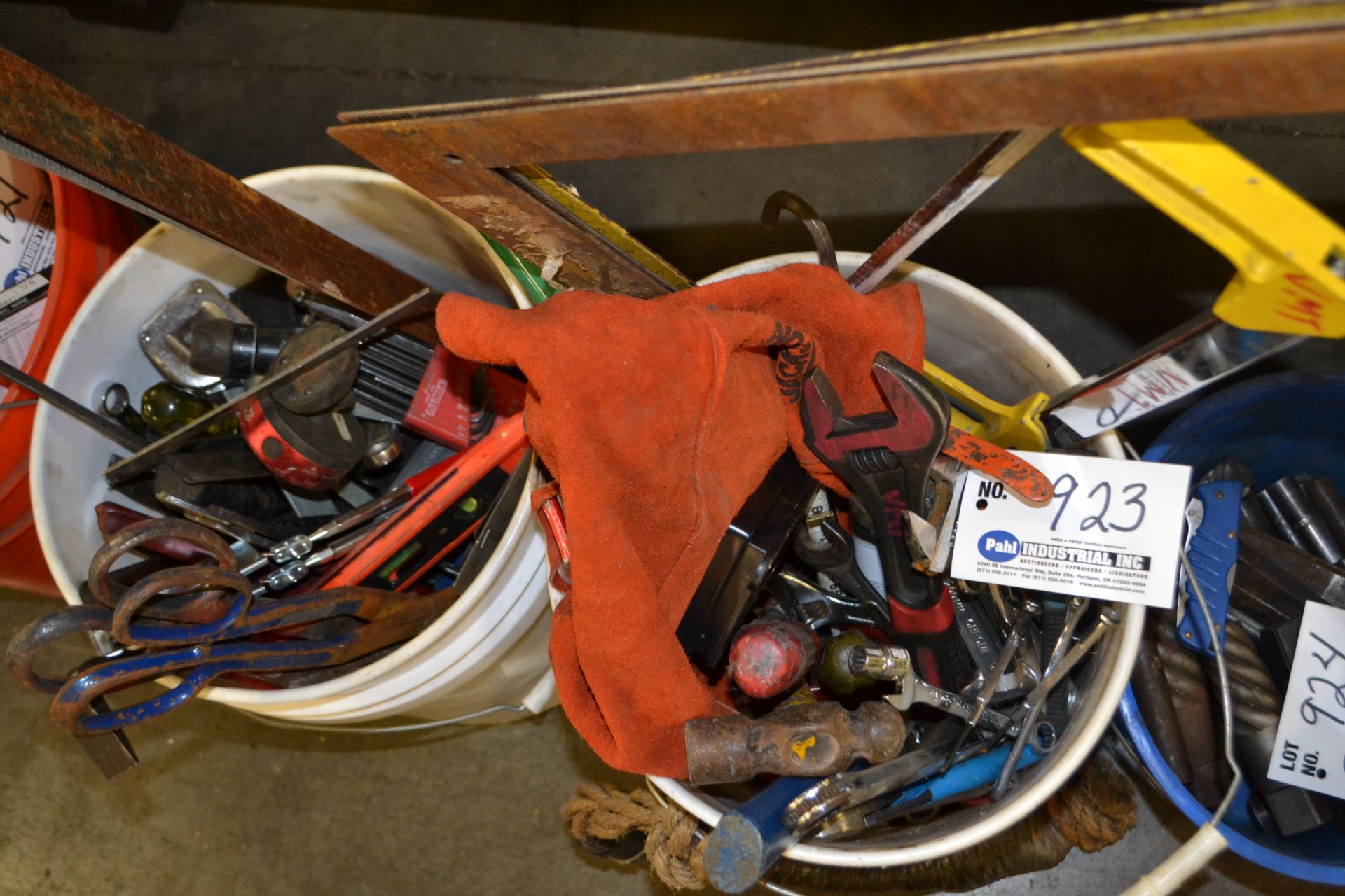 bucket of assorted tools