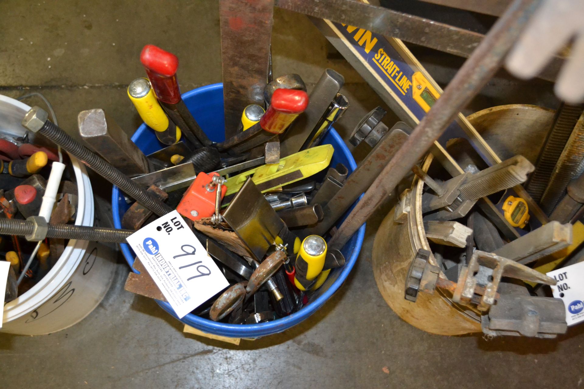 bucket of assorted tools