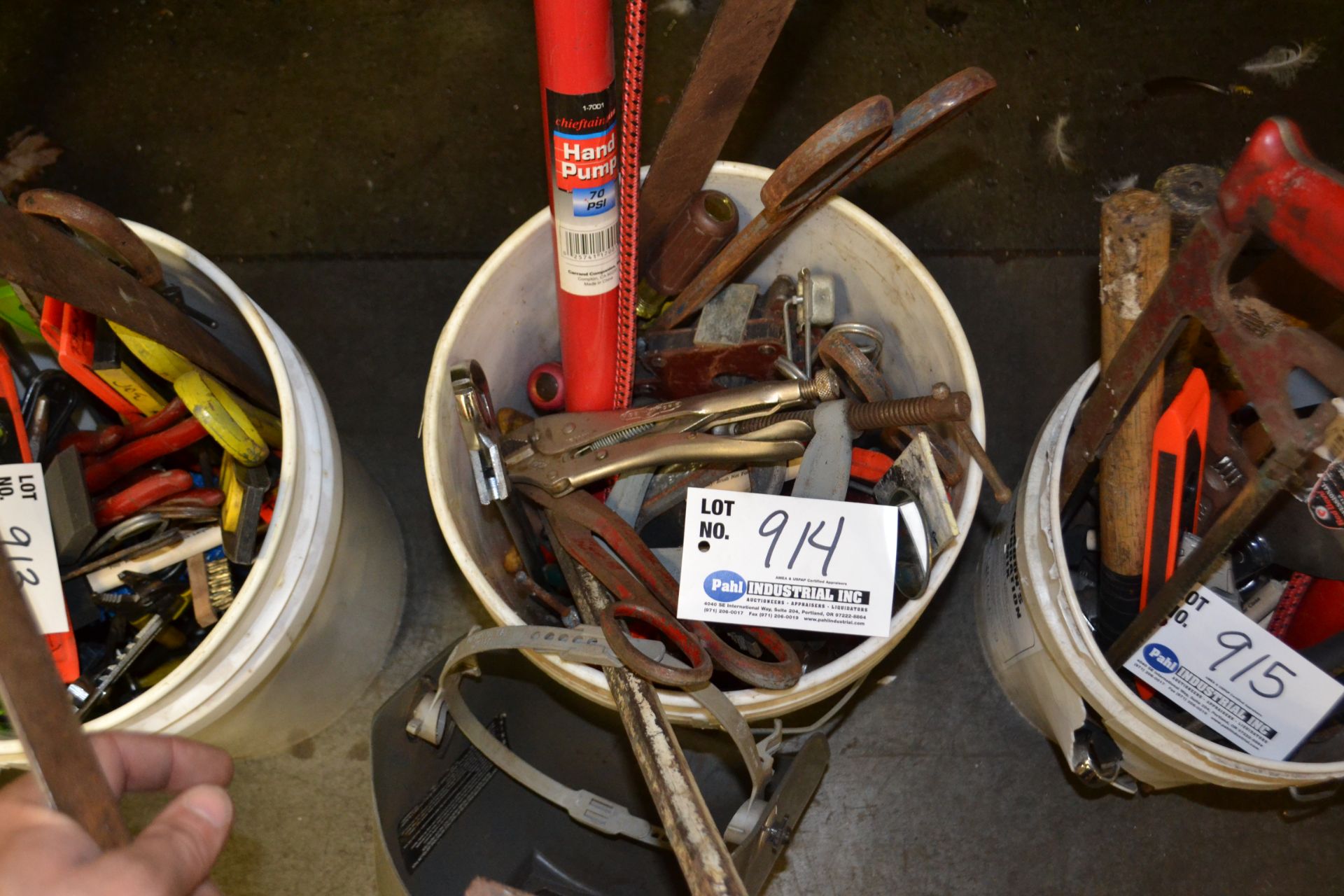 bucket of assorted tools