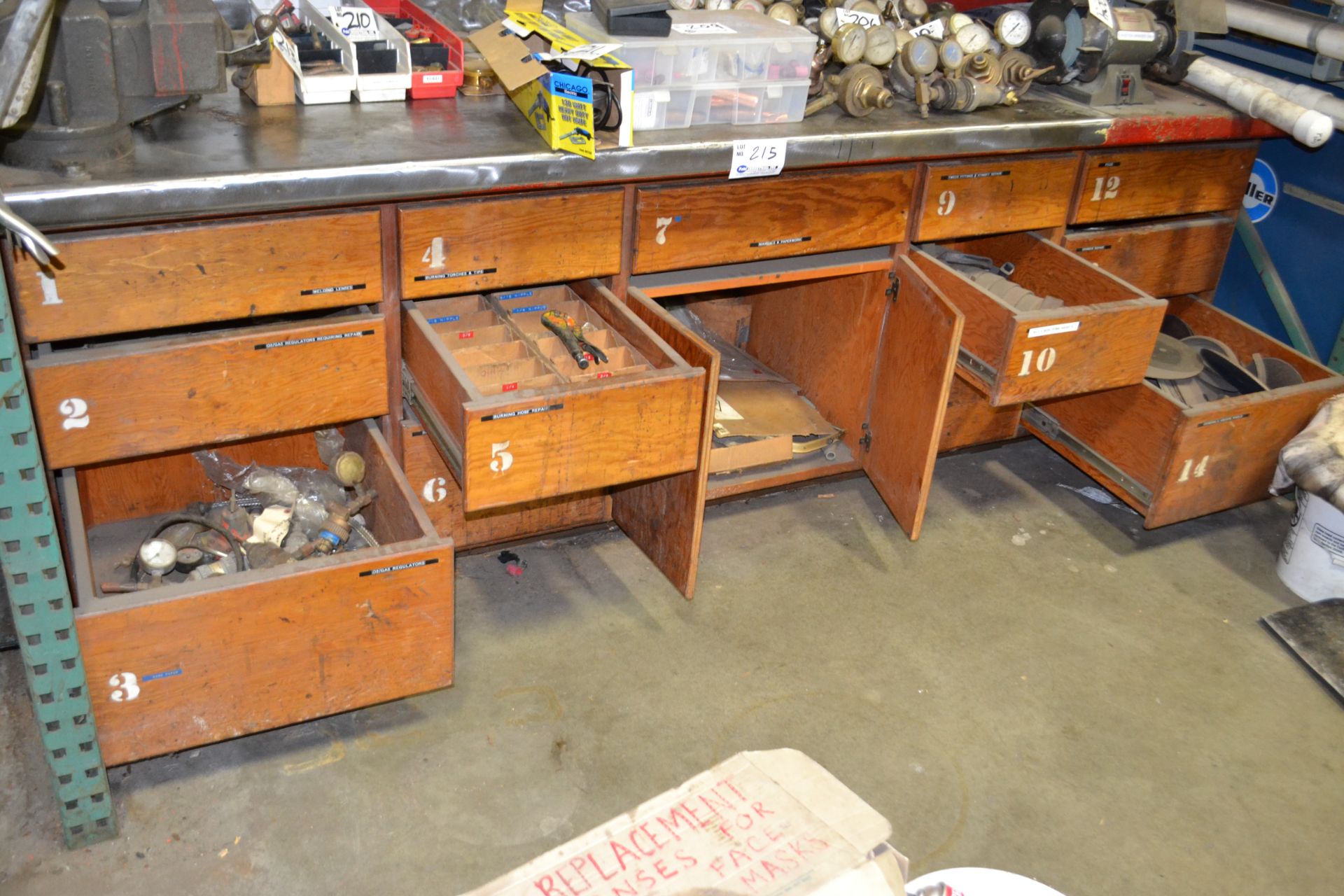 9' x 32" Steel Top work bench with contents in drawers (grinding wheels, files, fittings, gauges)