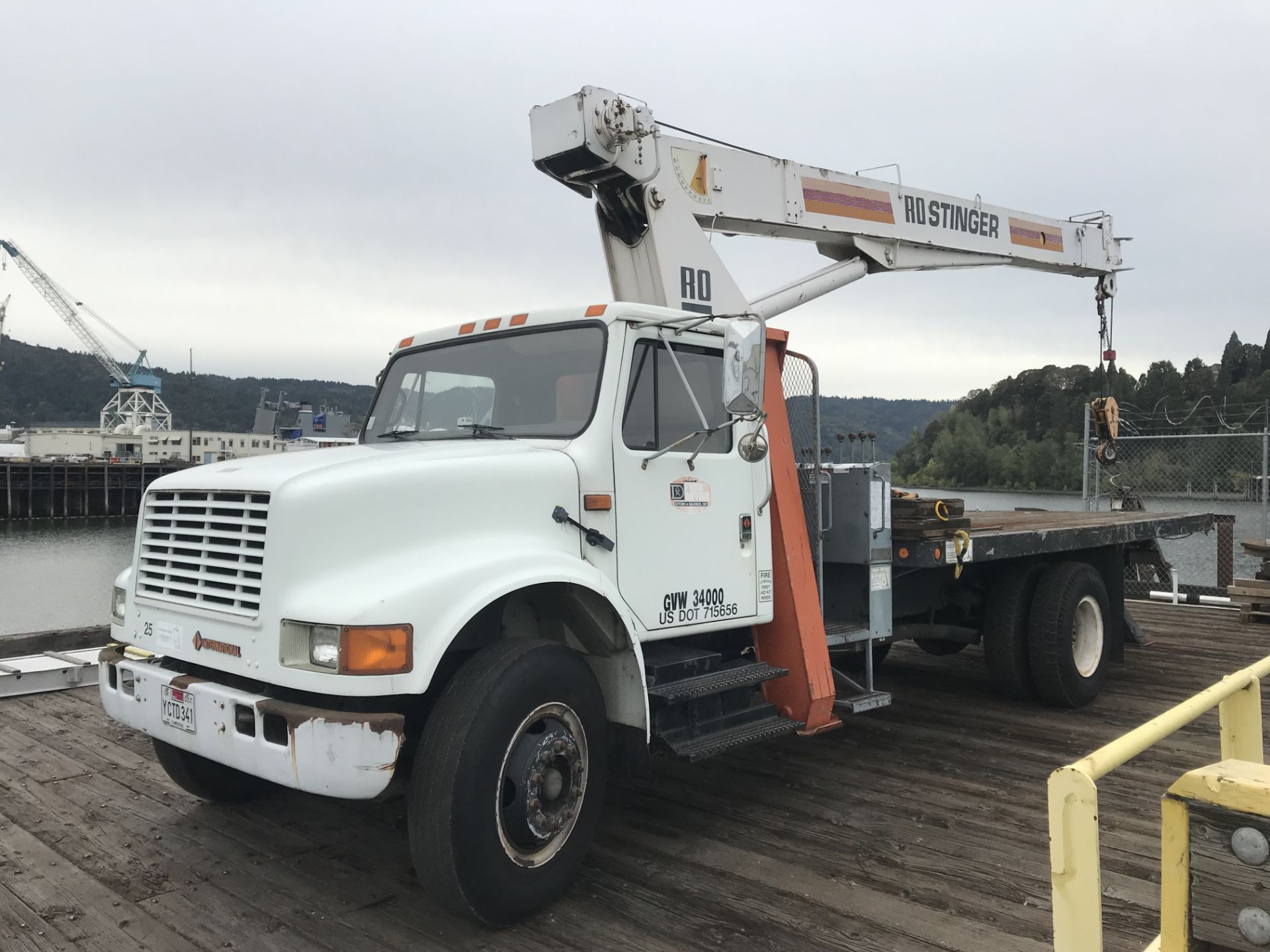 International 4700 Boom Crane Truck p/w Navistar Diesel, RO TC2863 Crane attachment on 18" Flatdeck