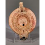 ROMAN TERRACOTTA OIL LAMP WITH WOLF