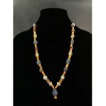 ROMAN PERIOD GLASS AND STONE BEADED NECKLACE