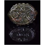 DARK AGES PERIOD BRONZE RING WITH MYSTERIOUS SYMBOL