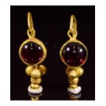 PAIR OF ROMAN GOLD EARRINGS WITH GARNETS