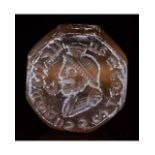 SASSANIAN AMBER BEAD WITH KING PORTRAIT