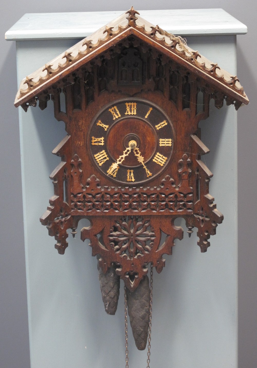 LATE 19TH CENTURY BAVARIAN GOTHIC DESIGN HANGING CUCKOO CLOCK having Roman numerals,