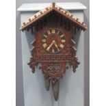 LATE 19TH CENTURY BAVARIAN GOTHIC DESIGN HANGING CUCKOO CLOCK having Roman numerals,