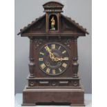19TH CENTURY BAVARIAN STAINED ARCHITECTURAL AUTOMATON TWO TRAIN CLOCK having Roman numerals,