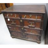 17TH CENTURY STRAIGHT FRONTED OAK CHEST of two short and three long graduated drawers all with