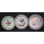 THREE SWANSEA POTTERY RETICULATED PLATES, to include; pink lustre building,