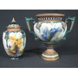 ROYAL WORCESTER HADLEY'S PORCELAIN TWIN HANDLED URN SHAPED VASE on a circular stepped relief