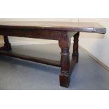 17TH CENTURY STYLE OAK REFECTORY TABLE having cleated planked top,