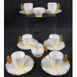 FOURTEEN PIECE AYNSLEY PORCELAIN TEA SERVICE of fluted form with yellow decoration and butterfly